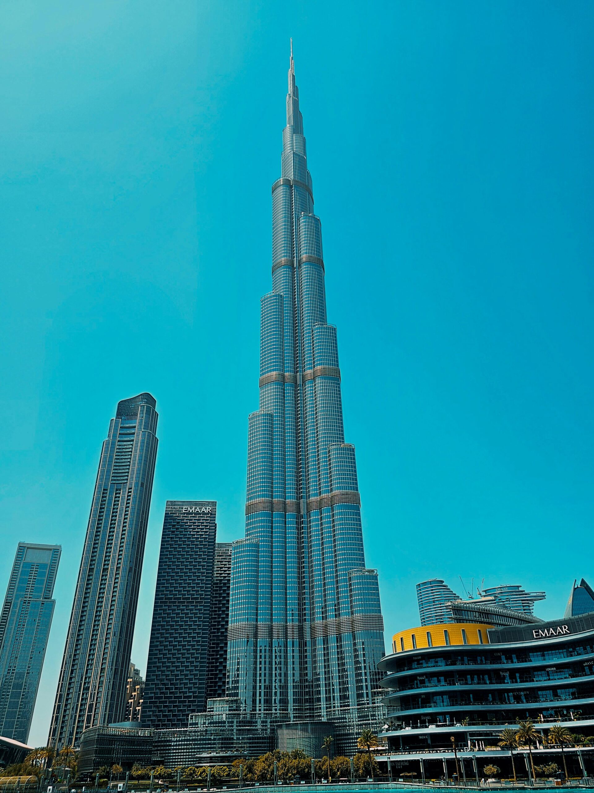 Stunning photo of Burj Khalifa, capturing Dubai's modern skyline against a clear blue sky.